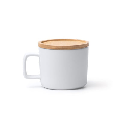 Tazza in ceramica con finitura esterna opaca e manico quadrato. Capacità 350 ml sublimatica
